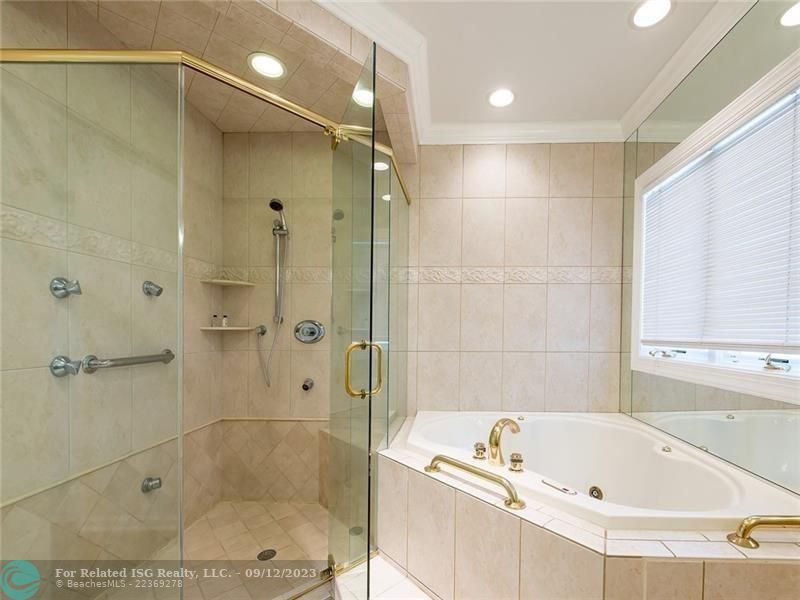 En Suite Master Bathroom with Jacuzzi Tub & Separate Shower.