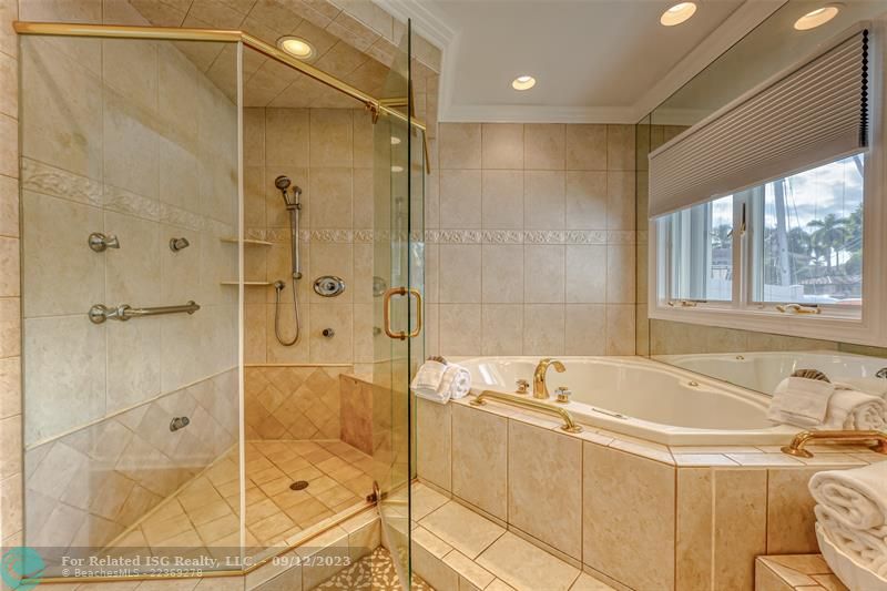 Jack and Jill Bathroom with Tub/Shower Combo.