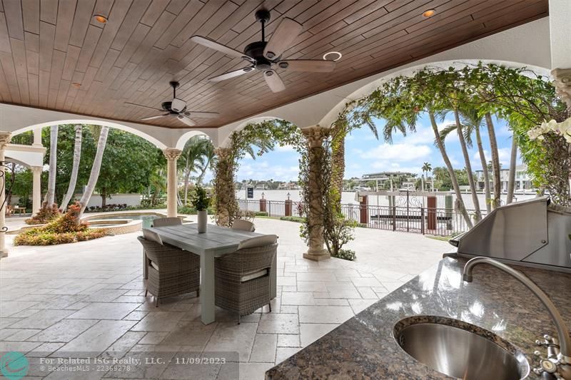 Covered outdoor kitchen and entertaining area