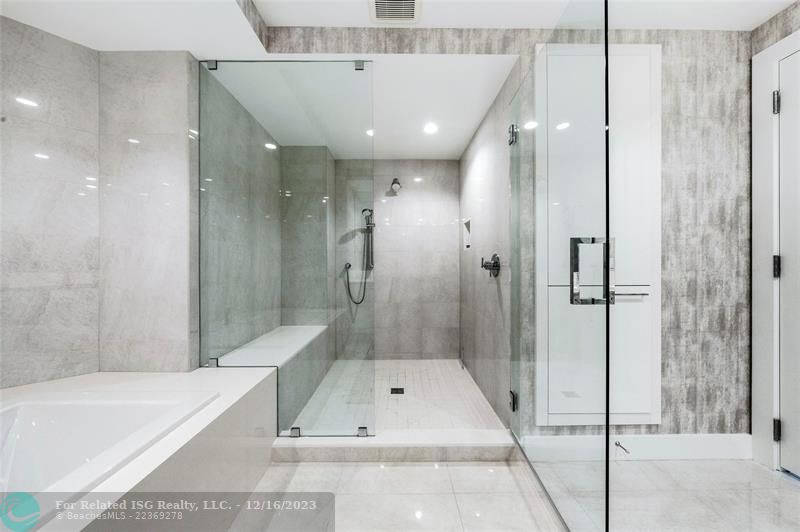Luxurious soaking tub + massive walk-in shower!