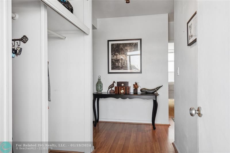 Bright, open, foyer. See views of cruise ships from your entrance through the bedroom window.