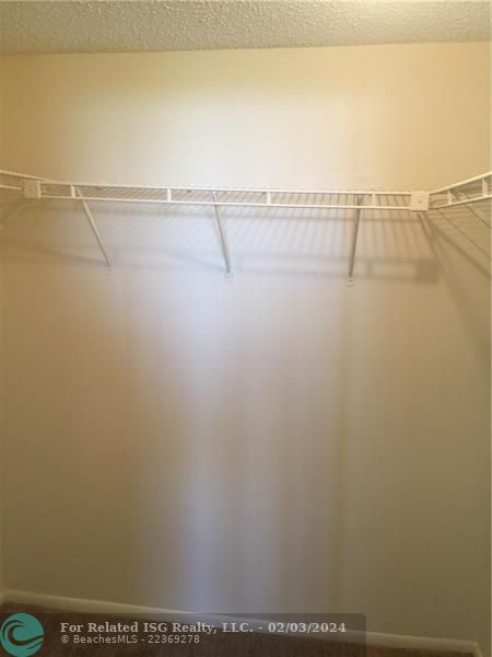 primary bedroom walk in closet