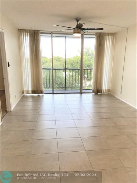 Huge living room and dining room with screened in balcony!