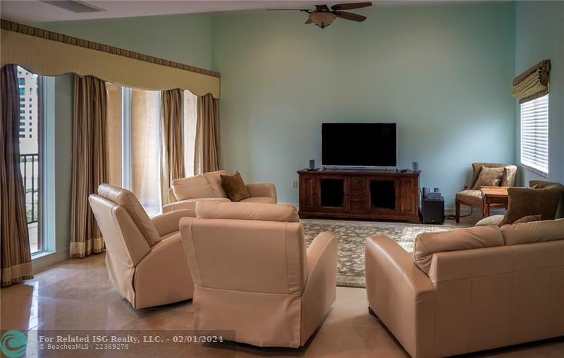 4th floor TV room with desk/murphy bed and dining/card tan;e