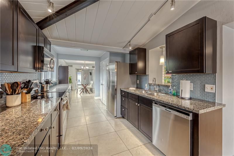 Main House Expansive Kitchen with Stainless Steel Appliances