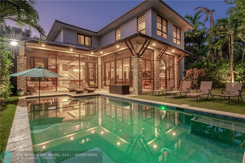 Front of HoFully appointed Luxury Vacation Home with Heated Pool in upscale Downtown Neighborhood walking distance to restaurants, pubs, shops & nightlife on Las Olas Blvd.e