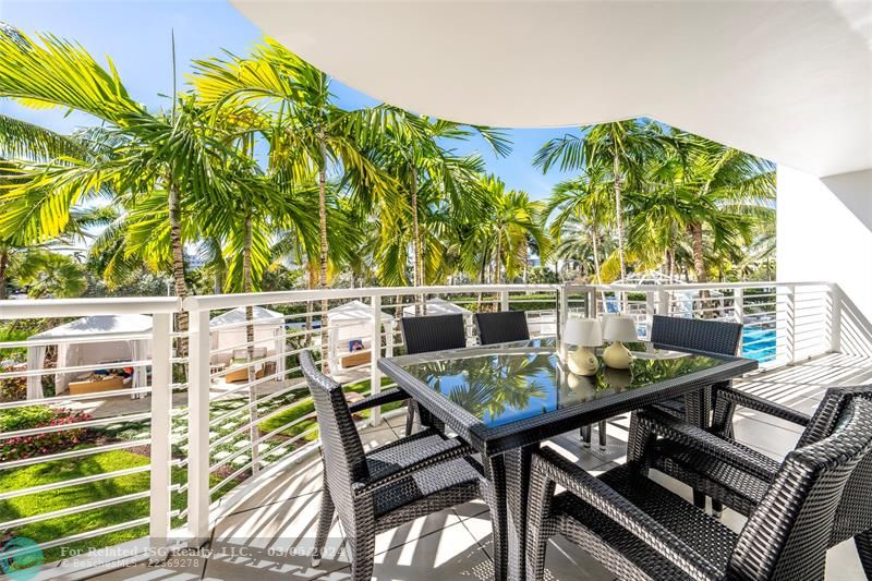 Gorgeous palms surround your full width balcony!