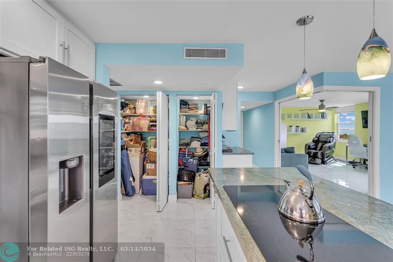 Pantry/Extra storage adjacent to kitchen-doors open