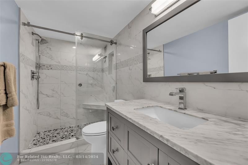 Guest bathroom has beautiful modern upgrades