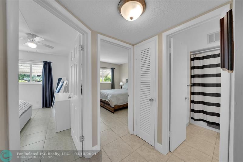 Hallway to bedrooms, bathrooms and linen closet