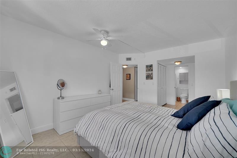 Hallway to bedrooms, bathrooms and linen closet