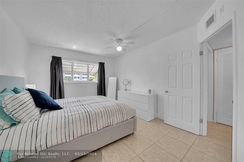 Hallway to bedrooms, bathrooms and linen closet