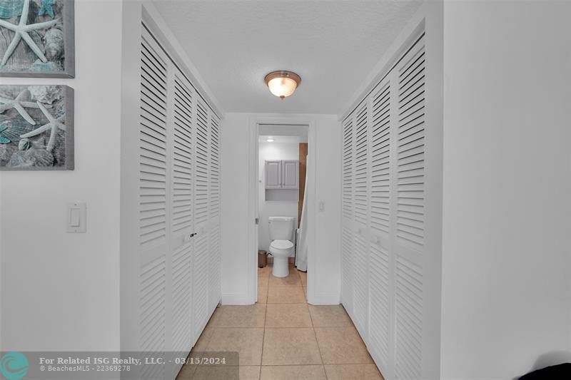 Double full wall closets in the primary bedroom