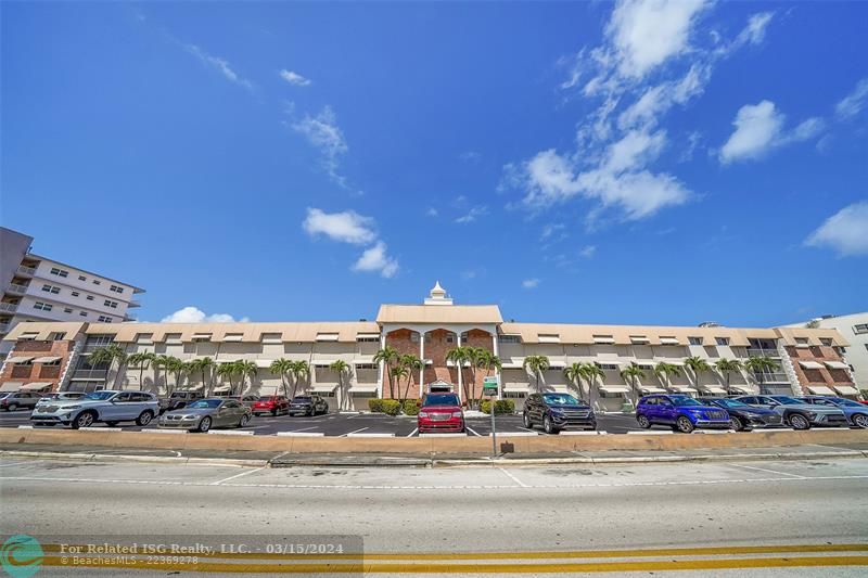 Residents and guests parking in front of the building