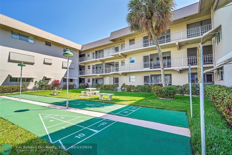 Challenge friends to a shuffleboard game