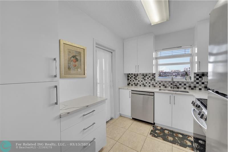 Modern kitchen with sunroom access