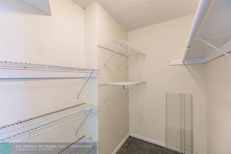 Large extra walk in closet in the hallway