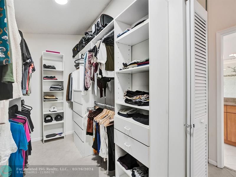 Master walk in closet with built ins