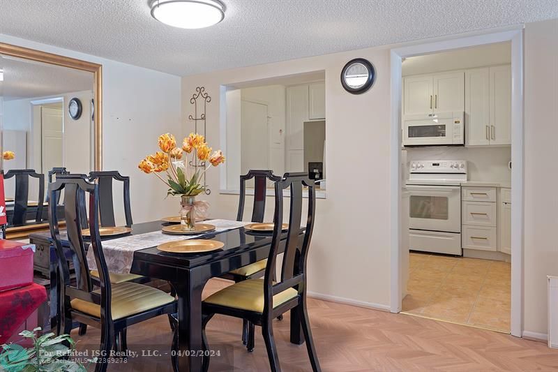 Dining Area Opening to Renovated Kitchen