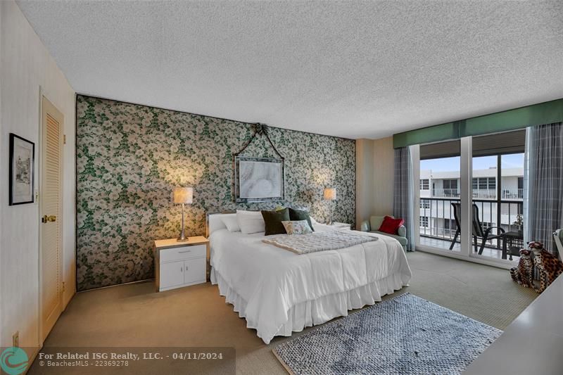 Primary Bedroom with Walk-in closet and Balcony