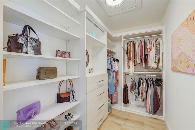 CUSTOM WALK IN CLOSET IN PRIMARY SUITE