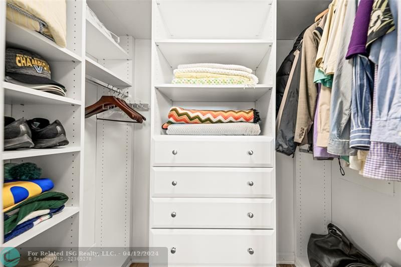 Primary Bedroom Walk-In Closet with Cabinetry