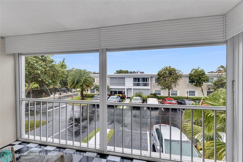 Screened Porch with view of canal