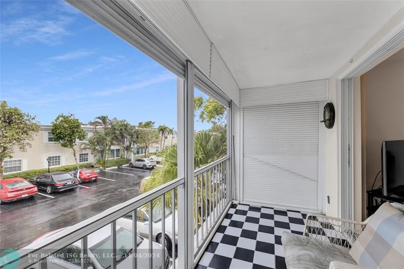 Screened Porch with view of canal