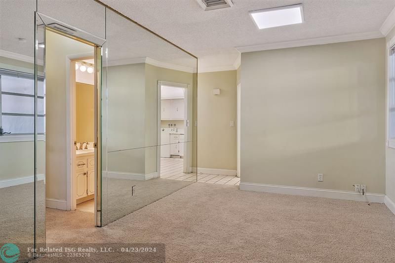 Entrance to Large Closet and Guest Bathroom