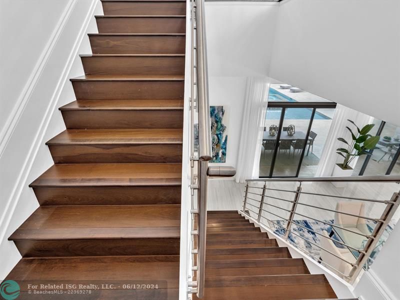 Large walk in pantry with refrigerated drawers and additional shelves on the left