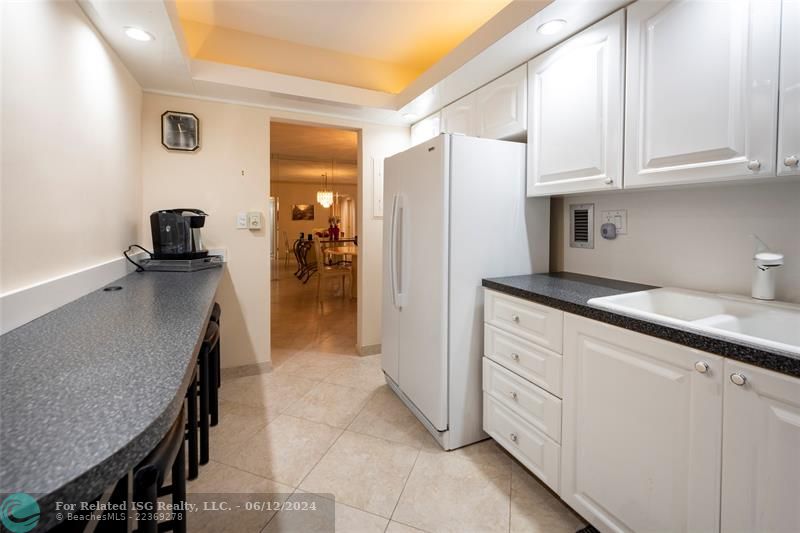 Large Pantry to left of the refrigerator and Lots of cabinet space