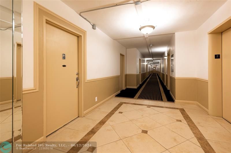 2 front entry doors, main into Living and Dining rm. Other leads right into the kitchen from hallway