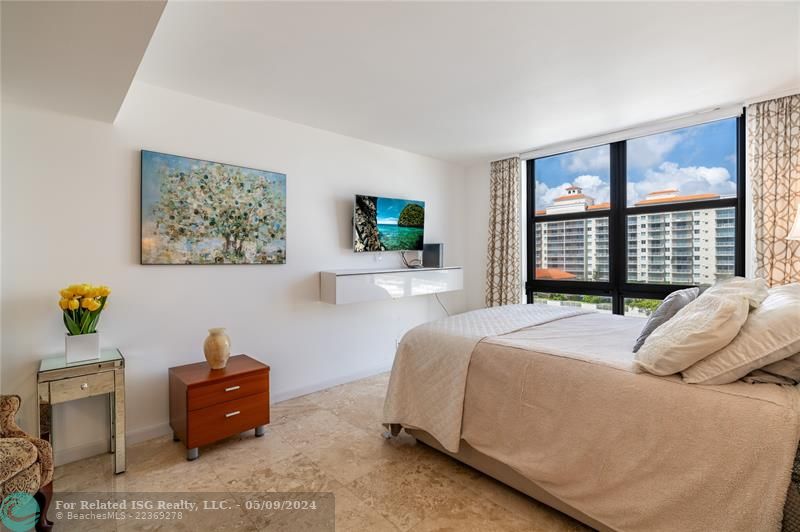 Good size bedroom, love the view with windows from ceiling to floor!