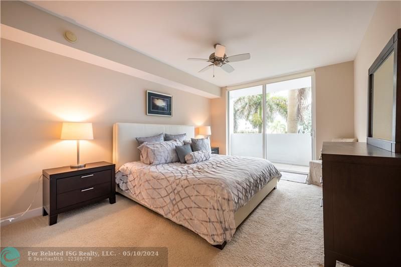 Primary bedroom opens to the balcony