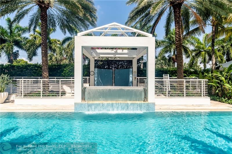 25 meter pool, jacuzzi behind the waterfall