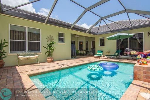 pool showing covered courtyard