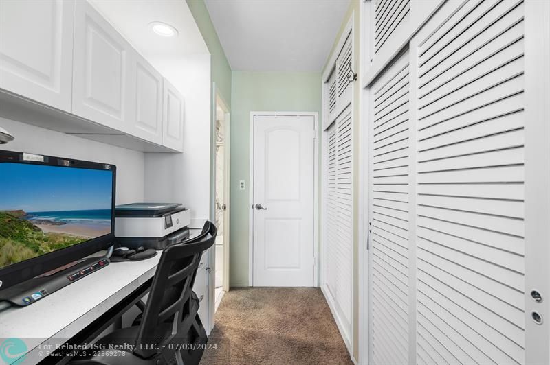 Primary bedroom wall of closets