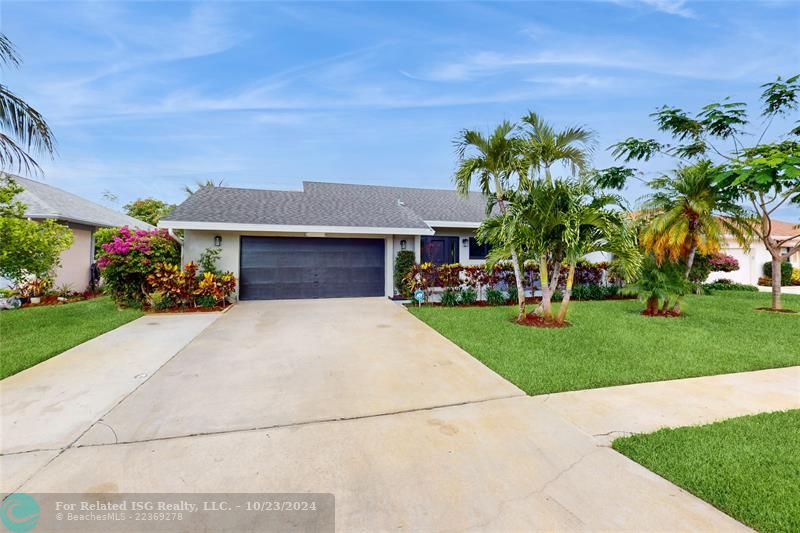 Front of home w/extended driveway