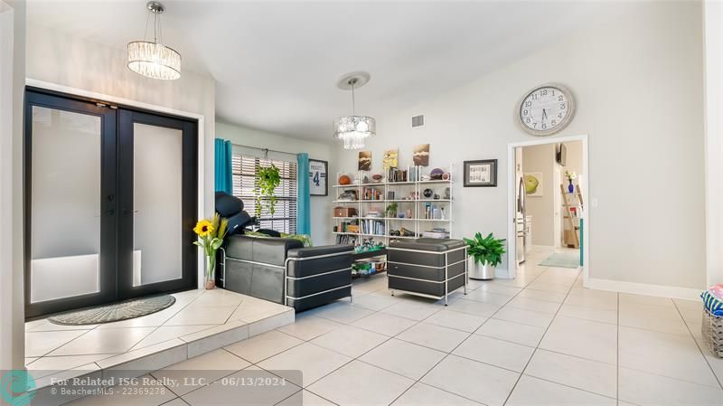 Step into the epitome of modern elegance with this open-concept living room, a central feature of the home.