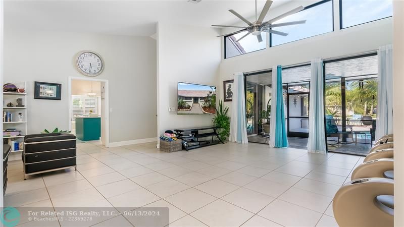 Step into the epitome of modern elegance with this open-concept living room, a central feature of the home