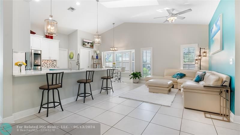 Dreamy Open Layout to make memories in this sunlit open-concept space where the family room seamlessly flows into sleek modern kitchen and elegant dining area, or walkout to the covered patio and enjoy life of luxury by the pool!