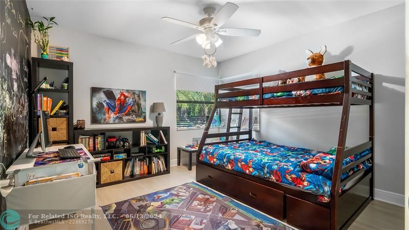 Step into this extraordinary bedroom and discover a magical space designed to inspire. With large windows bathing the room in warm, natural light, this retreat feels endlessly bright and airy with its waterfront views of the canal and pool.