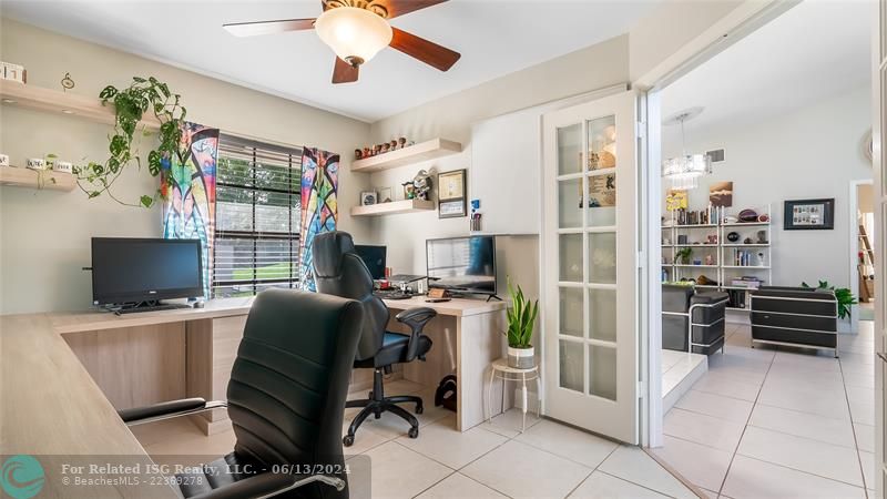 Luxury Home Office HavenStep through the elegant French doors and discover a true work-from-home oasis in this impeccably designed custom office space. Blending sophistication with intelligent functionality, it provides the perfect upscale setting for focused productivity.