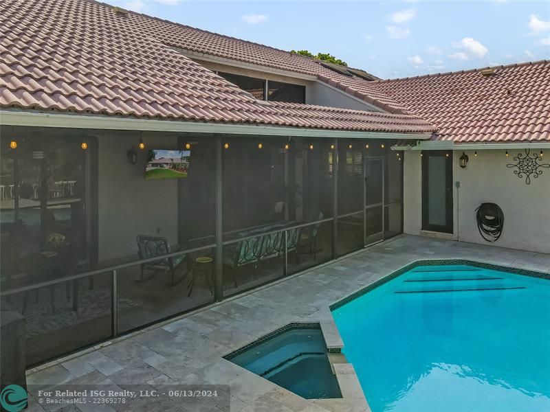 Resort-Style Waterfront Pool OasisImagine stepping out from the covered lanai into your very own waterfront pool paradise.