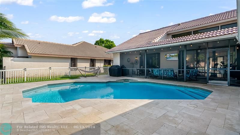 Whether hosting an elegant soiree, enjoying casual meals alfresco, or simply relaxing book-in-hand, this resort-like outdoor living room provides the ultimate setting.