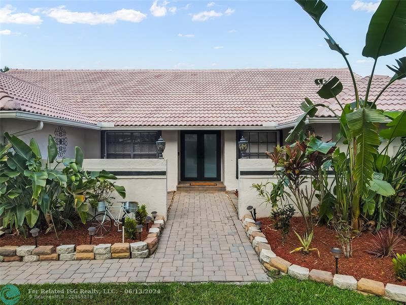 This home's curb appeal is further enhanced by its architectural details and the warm, welcoming atmosphere it exudes, promising a perfect blend of luxury and comfort.