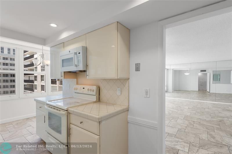 Virtually staged living and dining area.