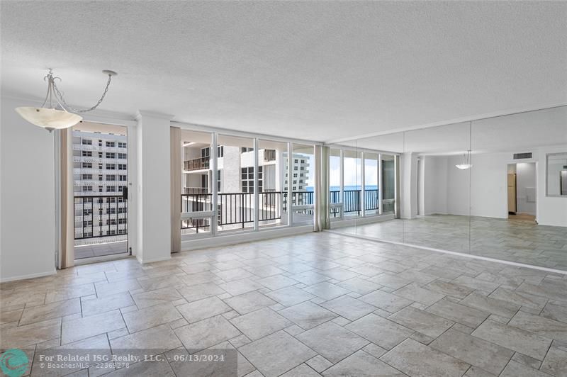 Virtually staged living and dining area.