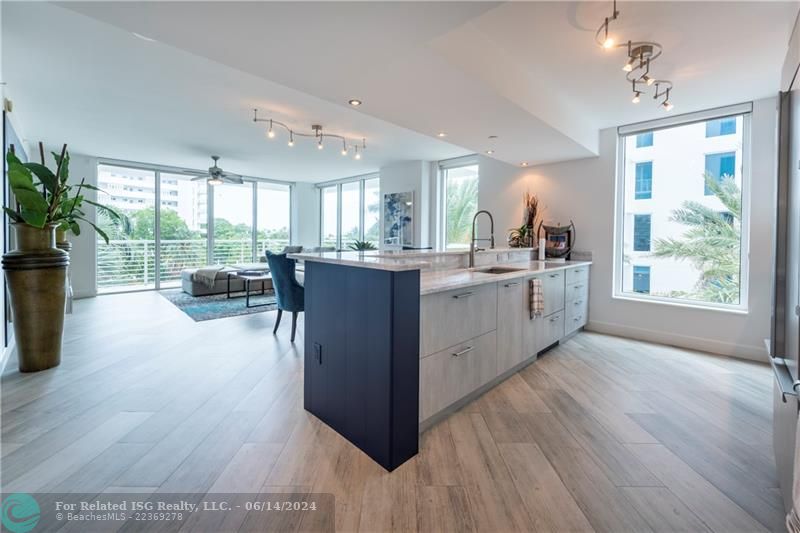 View from kitchen to living room and balcony