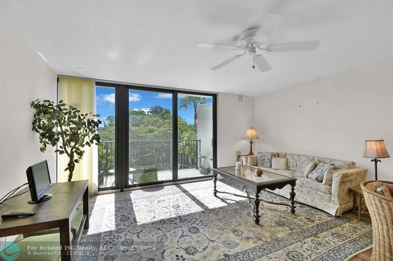 Living Room with Sliding Glass Doors to Balcony